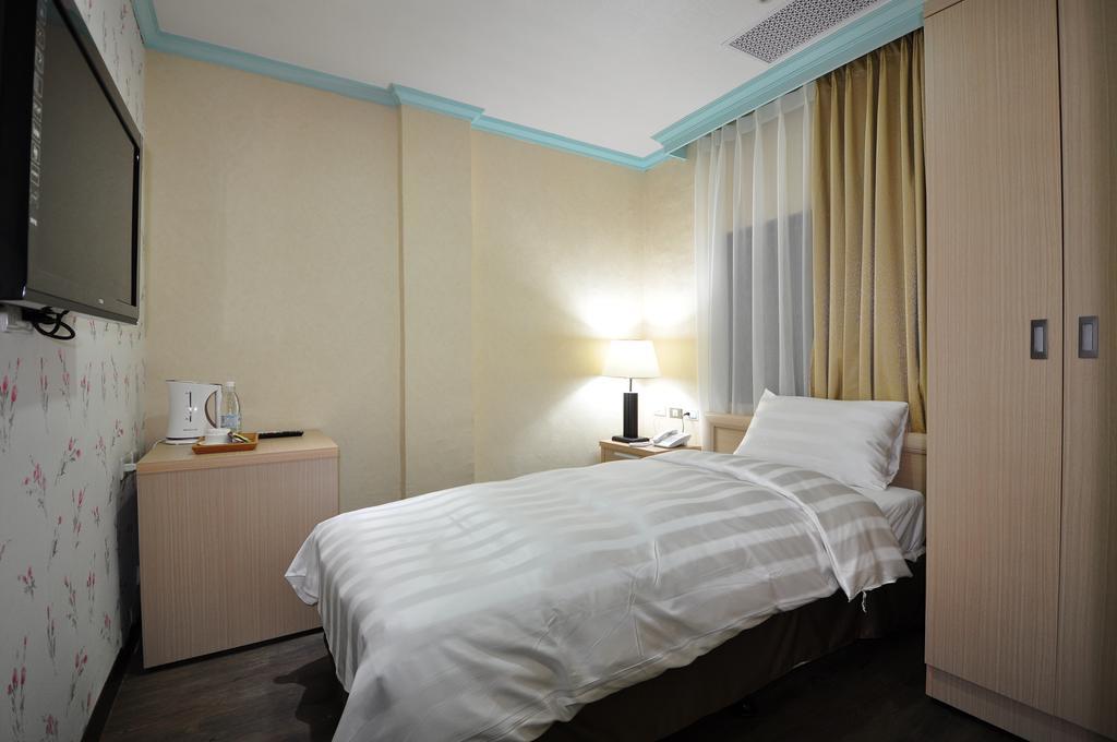 A Casa Hotel Taoyuan Værelse billede