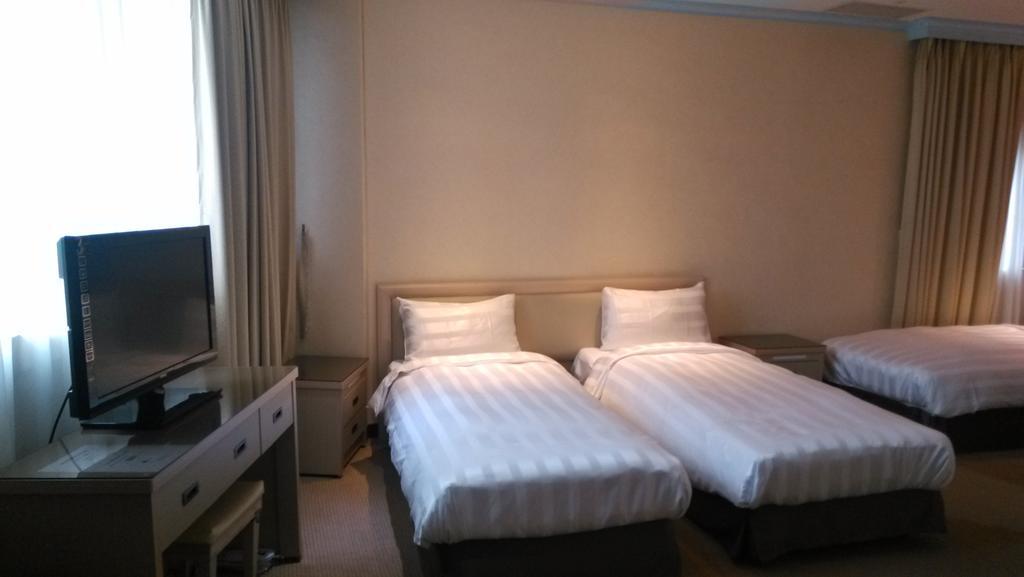 A Casa Hotel Taoyuan Værelse billede