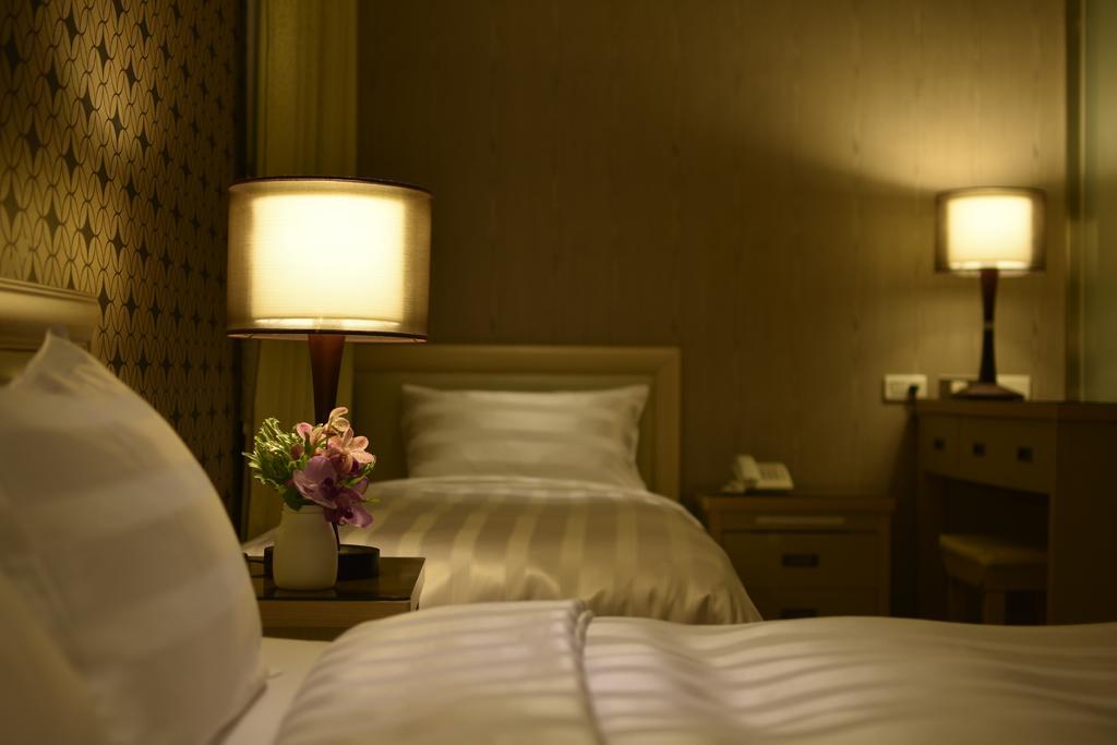 A Casa Hotel Taoyuan Værelse billede
