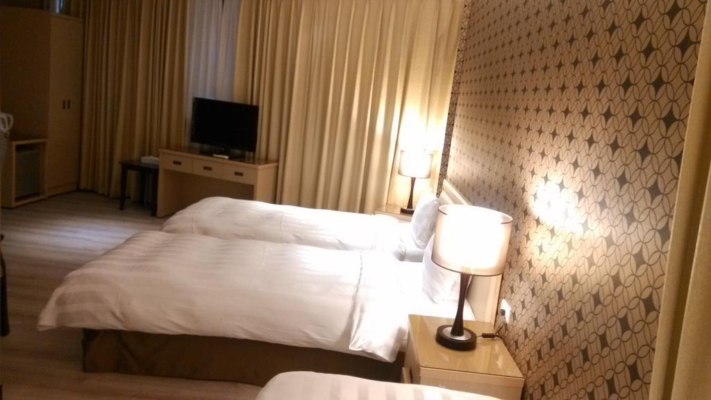 A Casa Hotel Taoyuan Værelse billede
