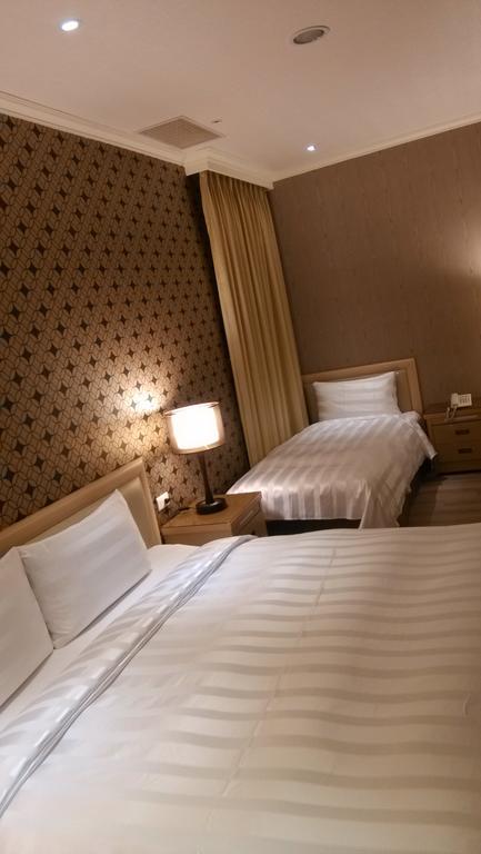 A Casa Hotel Taoyuan Værelse billede